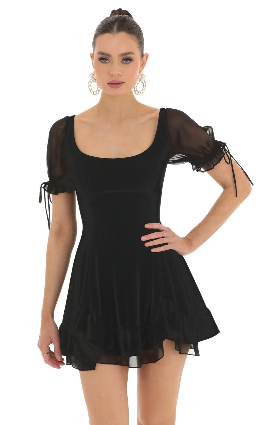 Picture Roux Velvet Short Sleeve Fit and Flare Dress in Black. Source: https://media.lucyinthesky.com/data/Feb23/850xAUTO/d8290651-2813-4a2b-9855-c3bf22c1e6e2.jpg