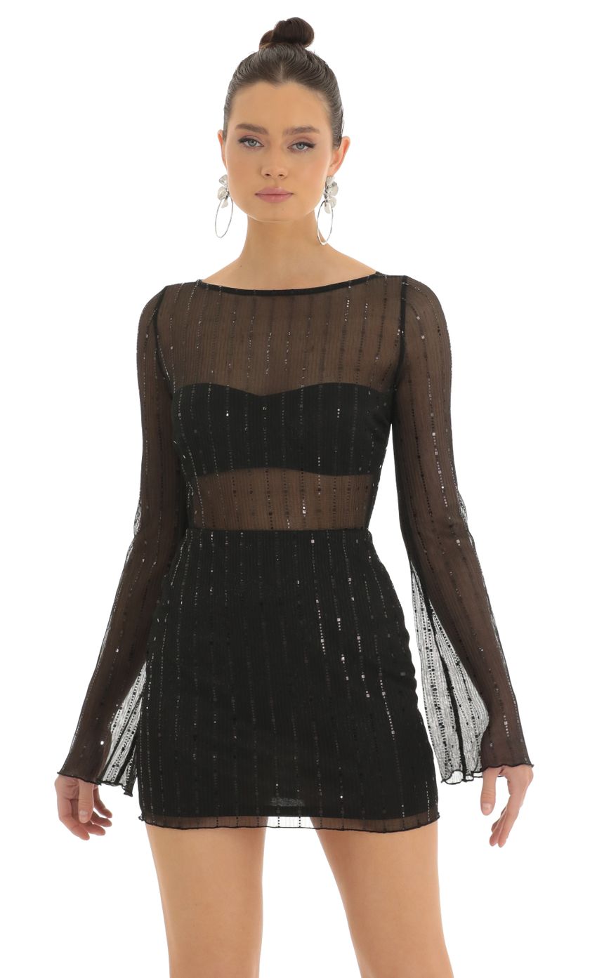 Picture Olean Sequin Striped Long Sleeve Dress in Black. Source: https://media.lucyinthesky.com/data/Feb23/850xAUTO/e0d79fd3-8cb2-401d-85db-f272a5a5fb04.jpg