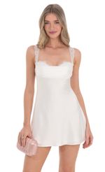 Picture Lace Strap Satin Dress in White. Source: https://media.lucyinthesky.com/data/Feb24/150xAUTO/32935269-cdf1-444e-b8b2-7ffea6db5153.jpg