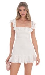 Picture Satin Ruffle Mini Dress in White. Source: https://media.lucyinthesky.com/data/Feb24/150xAUTO/73d810b4-5708-4963-8f2f-64c36754c147.jpg