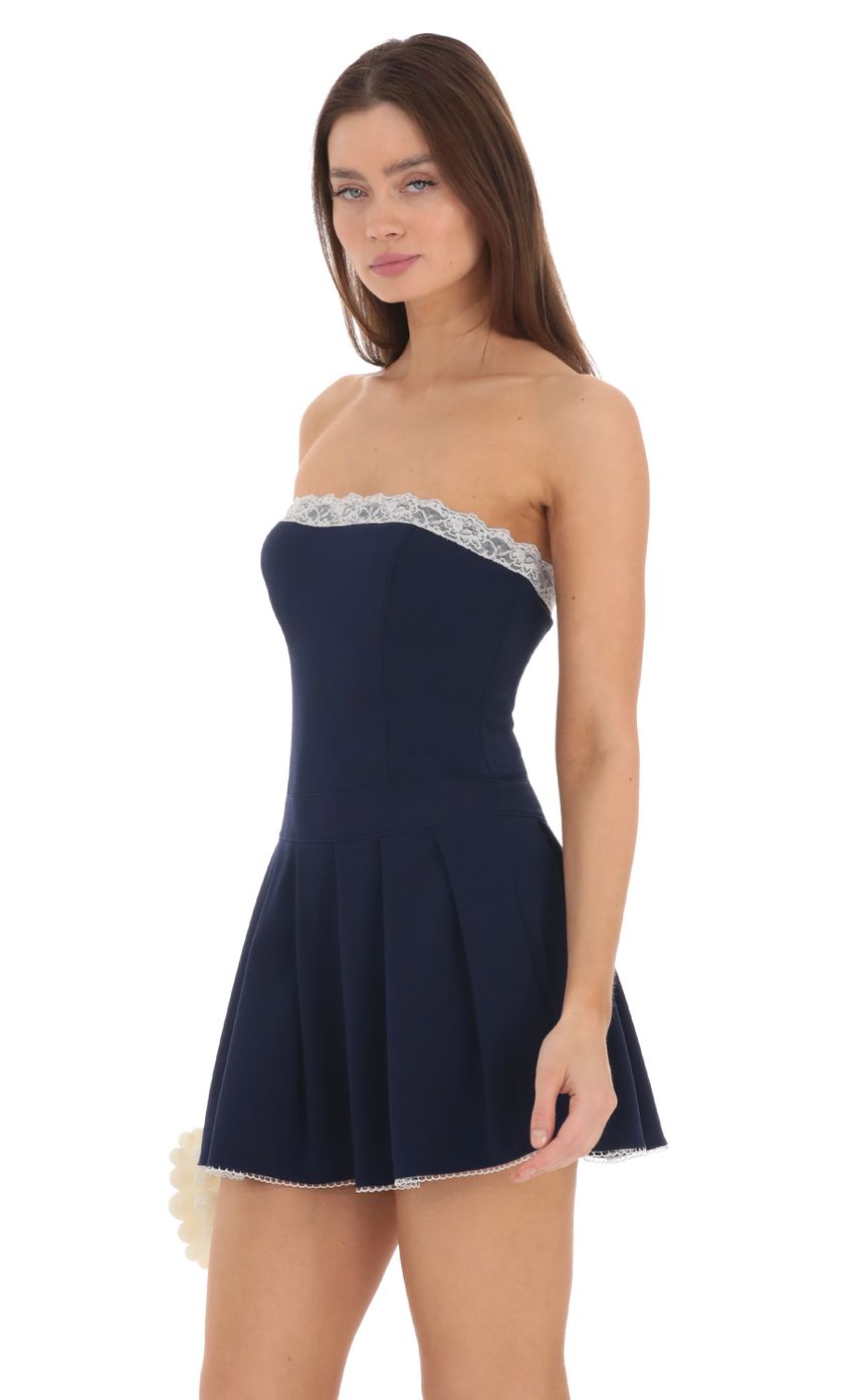 Picture Strapless Pleated Dress in Navy. Source: https://media.lucyinthesky.com/data/Feb24/850xAUTO/049299f7-d75c-4dc9-aad1-b58fe0f90947.jpg