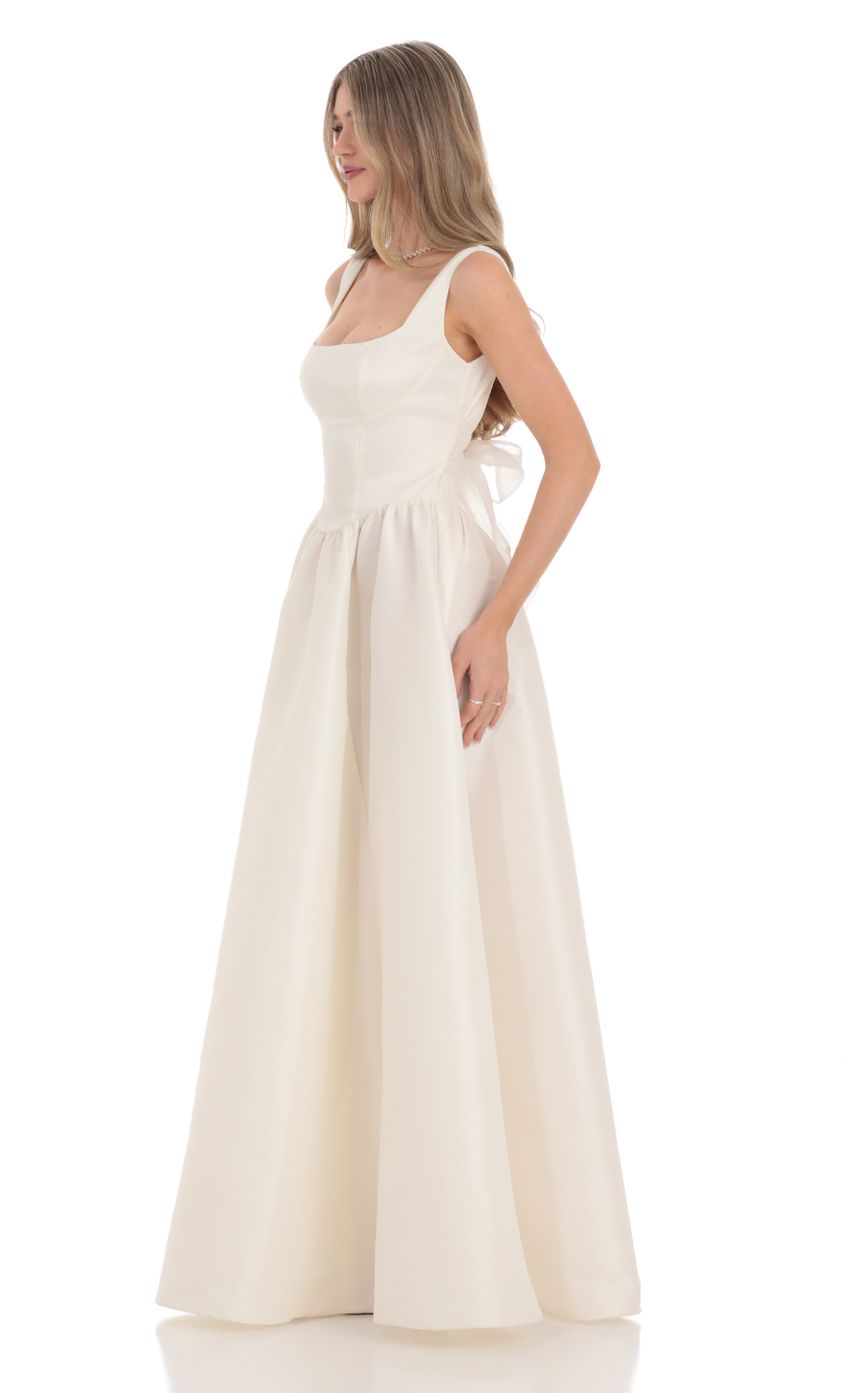Picture Back Bow Gown in White. Source: https://media.lucyinthesky.com/data/Feb24/850xAUTO/3bc338dd-3c5e-4b80-96e4-d7d9484633e0.jpg
