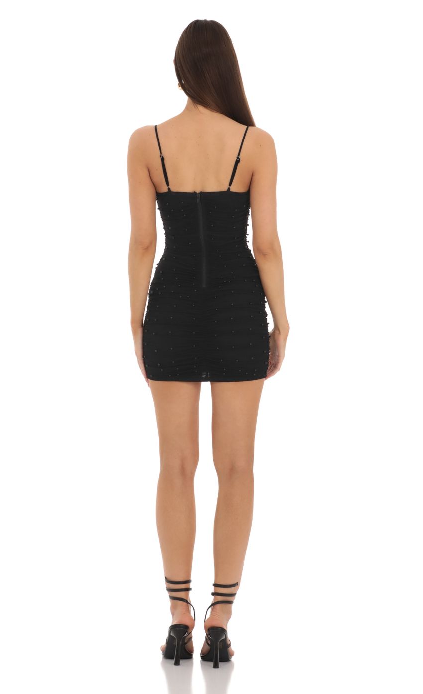 Picture Mesh Ruched Pearl Dress in Black. Source: https://media.lucyinthesky.com/data/Feb24/850xAUTO/3e6e8eb6-4106-493d-850b-7d9c9fa6d5d2.jpg