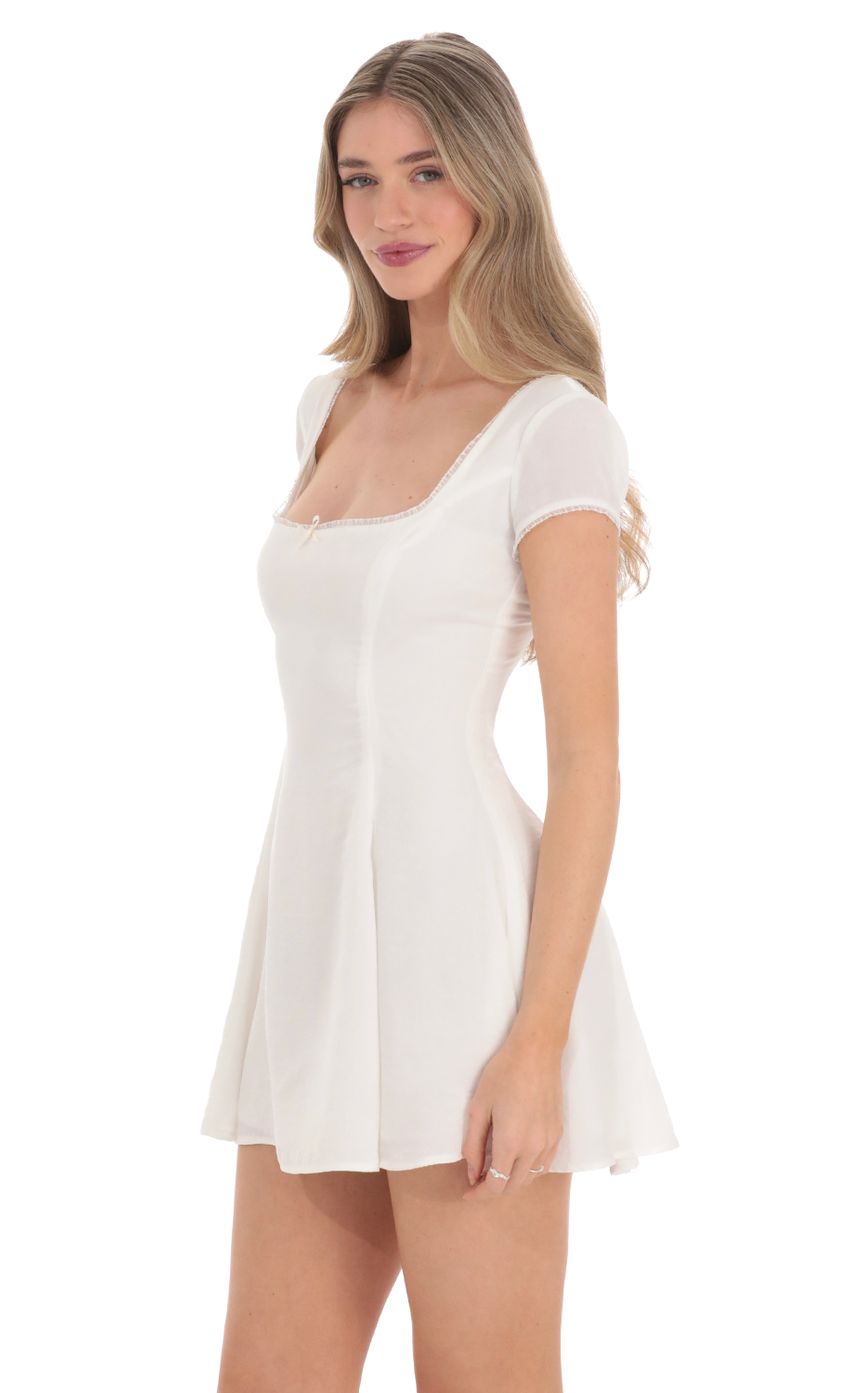 Picture Short Sleeve A-line Dress in White. Source: https://media.lucyinthesky.com/data/Feb24/850xAUTO/48579a84-4b88-4a21-9d8f-53bbfb40a697.jpg