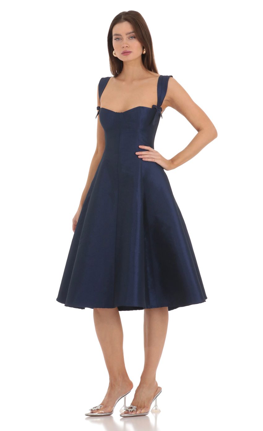 Picture Bow Ties Fit and Flare Midi Dress in Navy. Source: https://media.lucyinthesky.com/data/Feb24/850xAUTO/6e07e858-aa9a-4abe-a0c0-10ffc580c956.jpg
