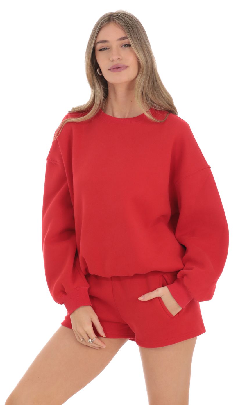 Picture Fleece Jumper in Cherry Red. Source: https://media.lucyinthesky.com/data/Feb24/850xAUTO/b518a99c-924e-4b12-a716-15fba6f19c54.jpg