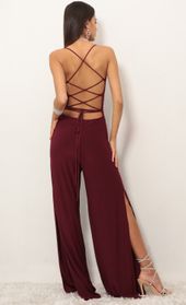 Picture thumb Eliana Cowl Neck Jumpsuit in Burgundy. Source: https://media.lucyinthesky.com/data/Jan19_1/170xAUTO/0Y5A9072.JPG