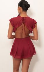 Picture Kara Cutout Romper in Maroon. Source: https://media.lucyinthesky.com/data/Jan19_2/150xAUTO/0Y5A2950S.JPG
