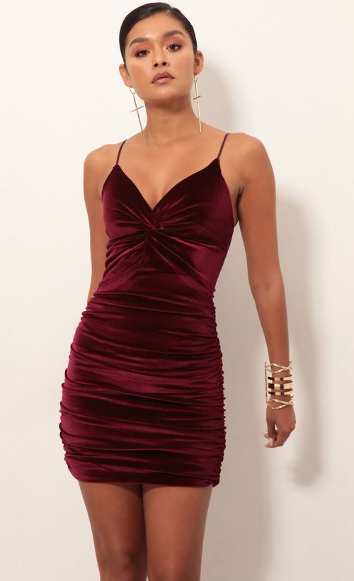 Picture Talia Front Twist Dress in Wine Velvet. Source: https://media.lucyinthesky.com/data/Jan19_2/500xAUTO/0Y5A4178.JPG