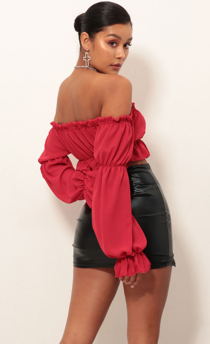 Picture Wild Thoughts Off the Shoulder Top in Red. Source: https://media.lucyinthesky.com/data/Jan19_2/800xAUTO/0Y5A3723.JPG