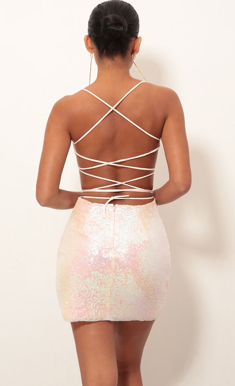 Picture Eli Party Sequin Dress in Pink Iridescent. Source: https://media.lucyinthesky.com/data/Jan19_2/800xAUTO/0Y5A4119.JPG