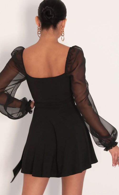Picture Aliah Puff Chiffon Wrap Dress in Black. Source: https://media.lucyinthesky.com/data/Jan20_2/500xAUTO/781A7793.JPG