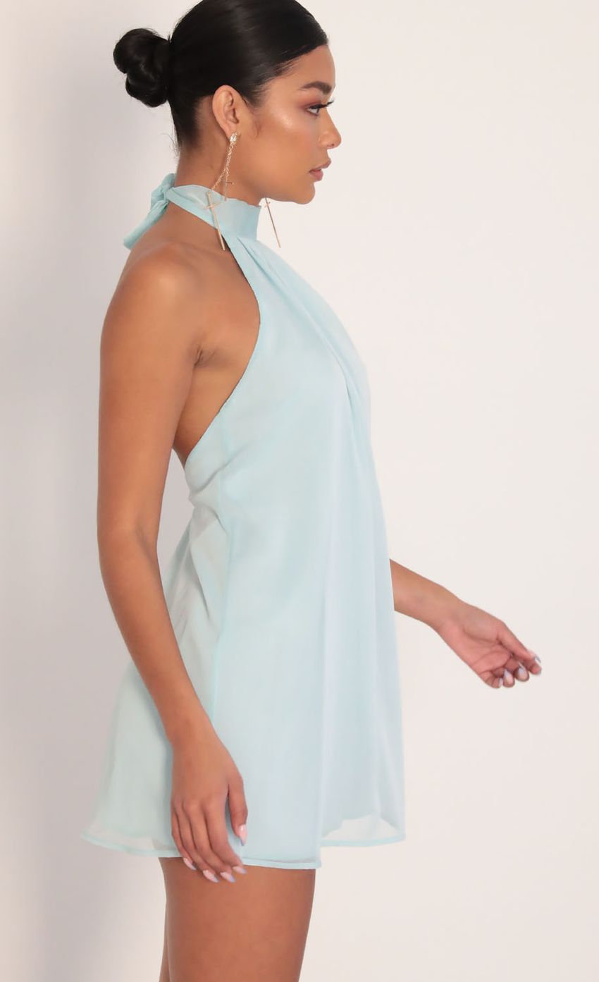 Picture Midnight Halter Dress in Aqua Blue. Source: https://media.lucyinthesky.com/data/Jan20_2/850xAUTO/781A8318.JPG