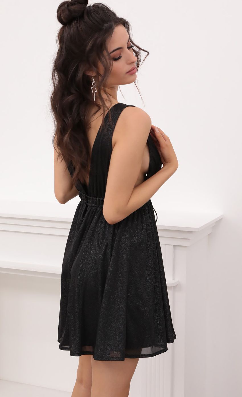 Picture Svana Plunge A-line Dress in Black Crystal. Source: https://media.lucyinthesky.com/data/Jan21_2/850xAUTO/1V9A5468.JPG