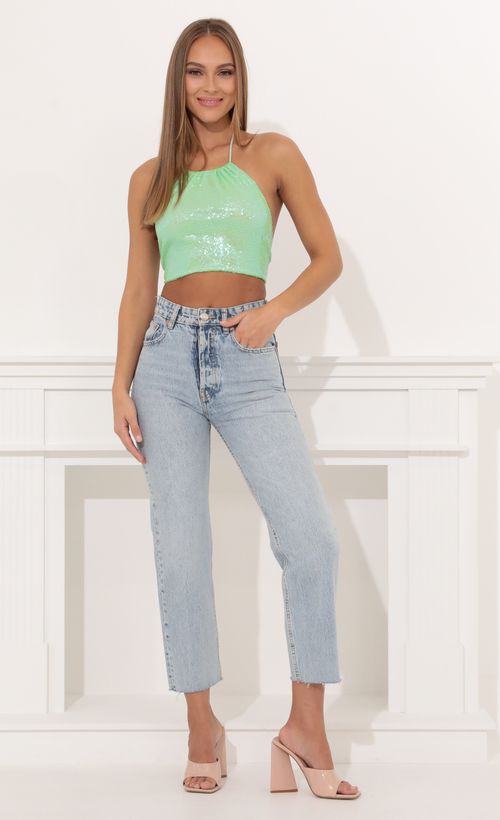 Picture Tali Iridescent Sequin Halter Top in Green. Source: https://media.lucyinthesky.com/data/Jan22_1/500xAUTO/1V9A2825.JPG