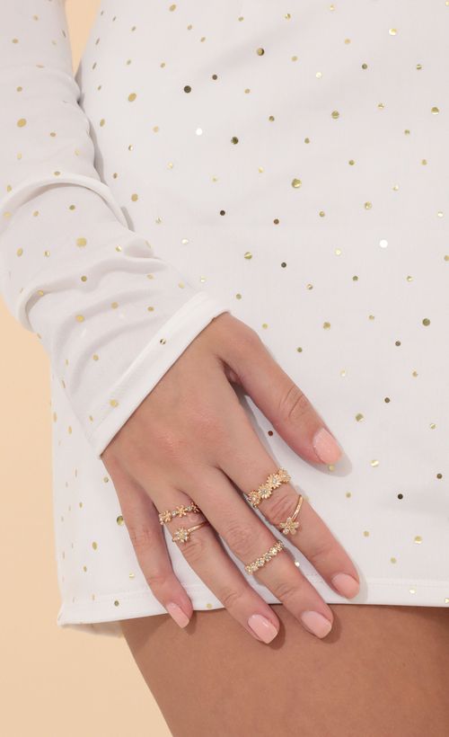 Picture Sweet Pea Ring Set in Gold. Source: https://media.lucyinthesky.com/data/Jan22_1/500xAUTO/1V9A4478.JPG