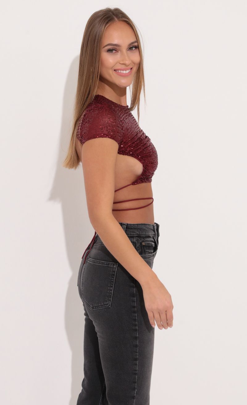Picture Veronica Open Back Top in Red Sequin. Source: https://media.lucyinthesky.com/data/Jan22_1/800xAUTO/1V9A3483.JPG