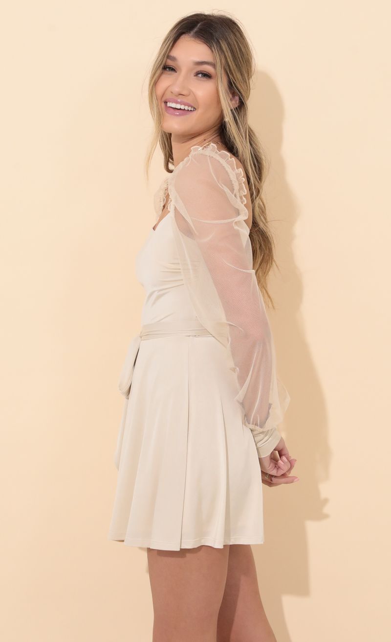 Picture Ari Long Sleeve Dress in Champagne. Source: https://media.lucyinthesky.com/data/Jan22_1/800xAUTO/1V9A3951.JPG
