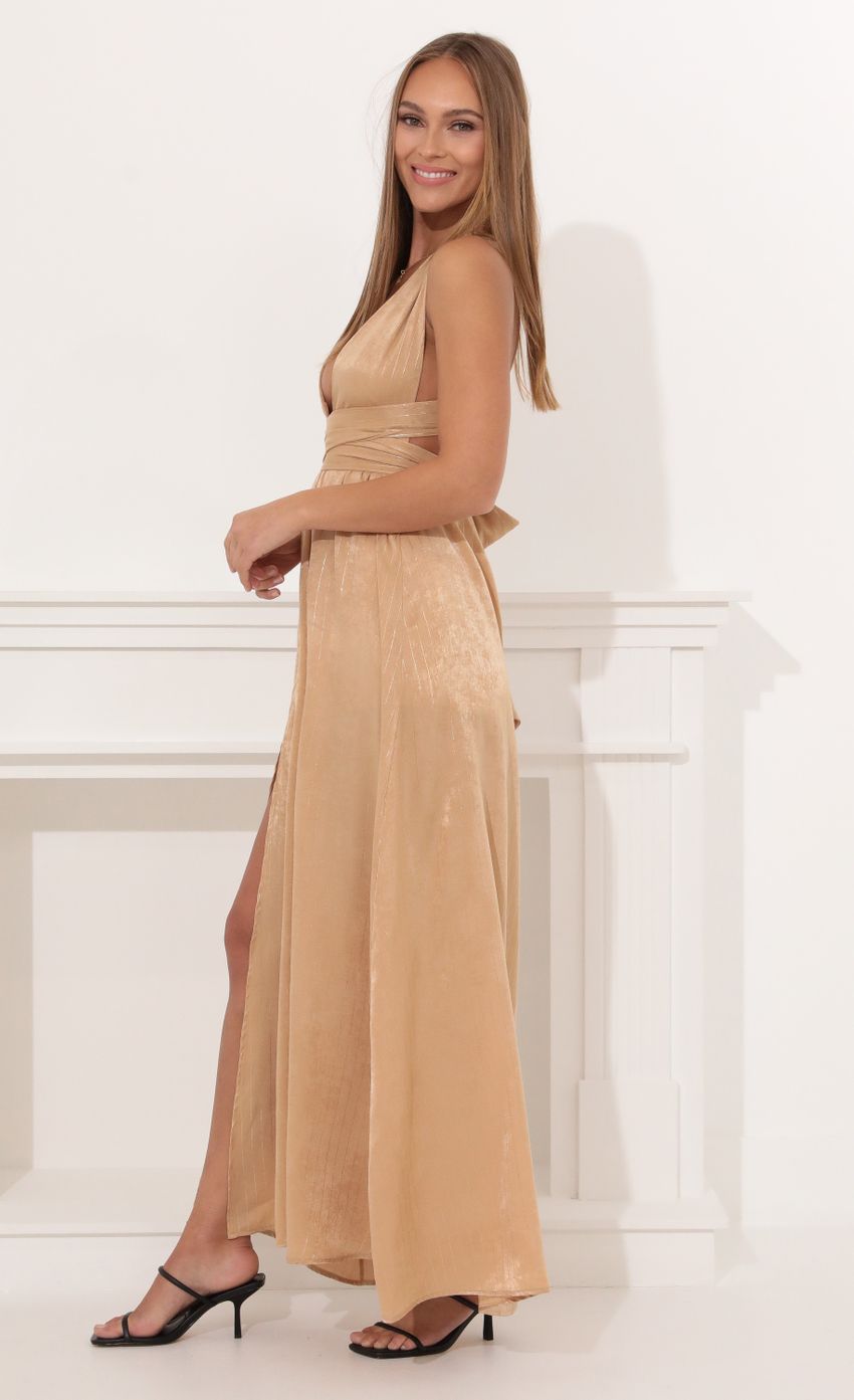 Picture Samara Satin Maxi Dress in Gold Pinstripe. Source: https://media.lucyinthesky.com/data/Jan22_1/850xAUTO/1V9A0681.JPG