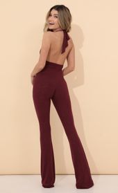 Picture thumb Freya Shimmer Jumpsuit in Burgundy. Source: https://media.lucyinthesky.com/data/Jan22_2/170xAUTO/1V9A49371.JPG