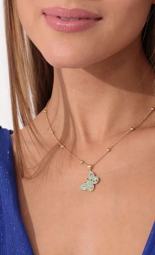 Picture You Make My Heart Flutter Necklace in Gold. Source: https://media.lucyinthesky.com/data/Jan22_2/500xAUTO/2V9A22131.JPG