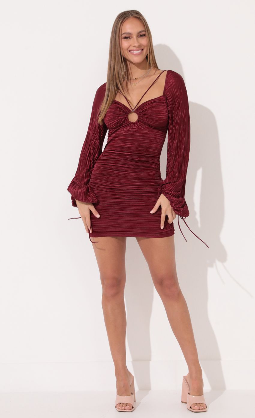 Picture Stevie Pleated Long Sleeve Dress in Ruby. Source: https://media.lucyinthesky.com/data/Jan22_2/850xAUTO/1V9A1128.JPG