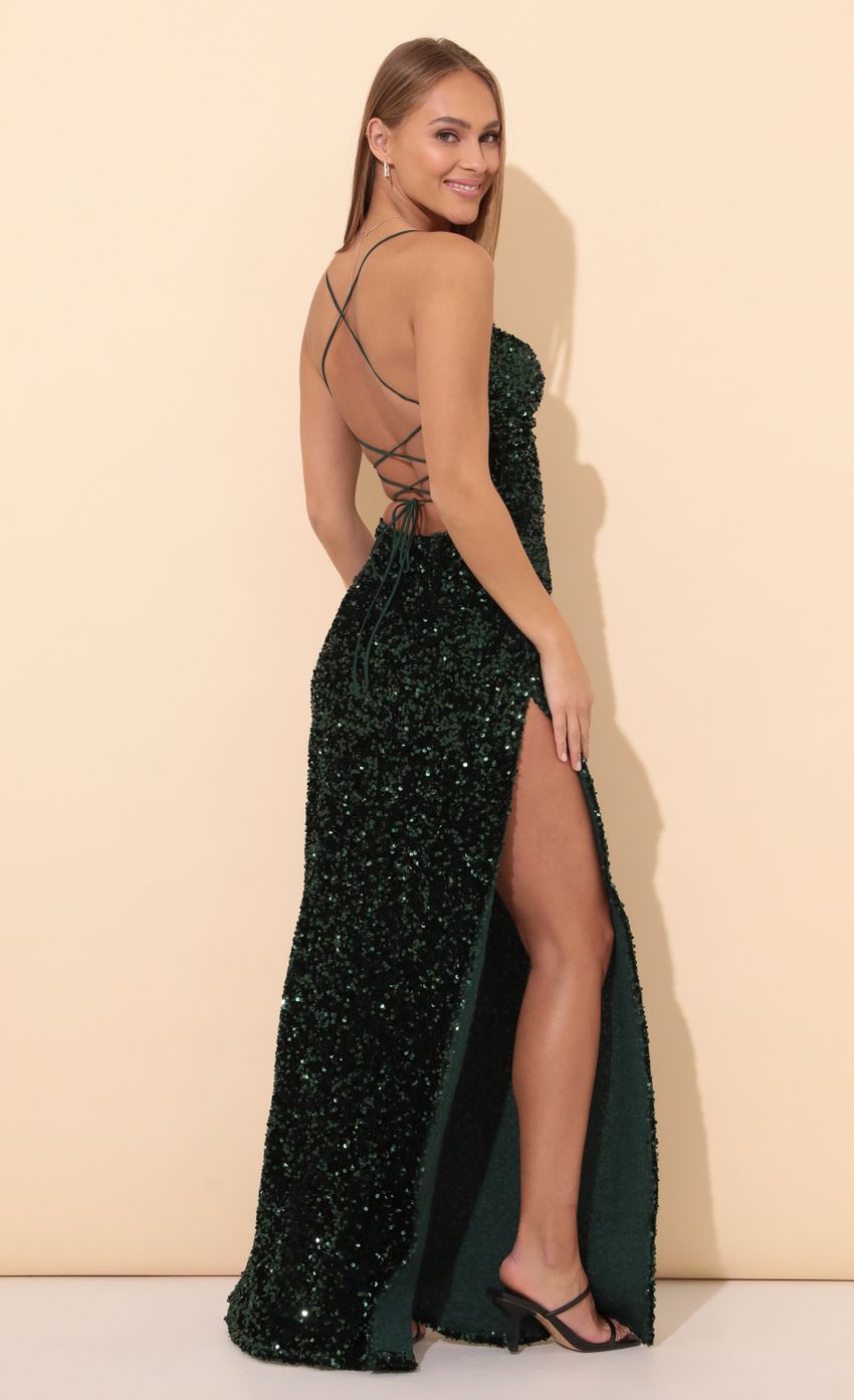 Picture Lissy Velvet Sequin Maxi Dress in Green. Source: https://media.lucyinthesky.com/data/Jan22_2/850xAUTO/1V9A7135.JPG