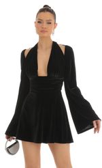 Picture Indya Velvet Cold Shoulder Plunge Dress in Black. Source: https://media.lucyinthesky.com/data/Jan23/150xAUTO/2e7cb296-d06a-42bf-bb0a-4f0489930b05.jpg