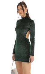Picture Agnes Glitter Open Back Dress in Green. Source: https://media.lucyinthesky.com/data/Jan23/150xAUTO/52c8b214-8dca-4bab-8d97-4c4e7c6f120c.jpg