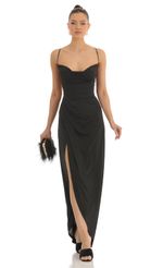 Picture Lovely Asymmetrical Maxi Dress in Black. Source: https://media.lucyinthesky.com/data/Jan23/150xAUTO/624c42c7-3557-49c0-a137-2f2cc9487343.jpg