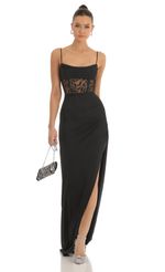 Picture Steffi Cutout Glitter Corset Maxi Dress in Black. Source: https://media.lucyinthesky.com/data/Jan23/150xAUTO/f1ae736b-32d6-4568-990a-ad63c22d2e8d.jpg