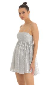 Picture thumb Liora Checkered Sequin Baby Doll Dress in Silver. Source: https://media.lucyinthesky.com/data/Jan23/170xAUTO/00e1e270-b5b5-47b6-a6cb-1d3caf2d46d2.jpg