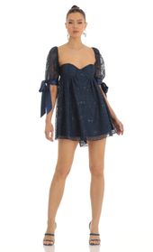 Picture thumb Maia Sequin Lace Baby Doll Dress in Dark Blue. Source: https://media.lucyinthesky.com/data/Jan23/170xAUTO/2051b226-fef8-4937-96bd-7f4cd57a2519.jpg