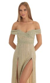 Picture thumb Sena Sequin Striped Off The Shoulder Maxi Dress in Gold. Source: https://media.lucyinthesky.com/data/Jan23/170xAUTO/33178603-1a9d-4c26-b8b9-db62858da23e.jpg