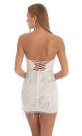 Picture thumb Hollie Dangling Sequin Corset Dress in White. Source: https://media.lucyinthesky.com/data/Jan23/170xAUTO/431acaa9-0ba9-4934-a5d2-9978c765e08d.jpg
