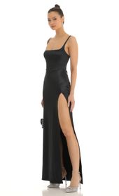 Picture thumb Casandra Satin Rhinestone Maxi Dress in Black. Source: https://media.lucyinthesky.com/data/Jan23/170xAUTO/45d6a039-1dd7-48b8-8828-8bfd912b027f.jpg