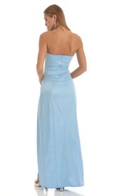 Picture thumb Nicholya Satin Pleated Strapless Maxi Dress in Baby Blue. Source: https://media.lucyinthesky.com/data/Jan23/170xAUTO/69319133-3d7e-4079-a23c-2205c38a5e78.jpg