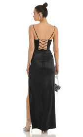 Picture thumb Casandra Satin Rhinestone Maxi Dress in Black. Source: https://media.lucyinthesky.com/data/Jan23/170xAUTO/a34eb51d-df18-4206-a1e2-88f4efc4bb36.jpg