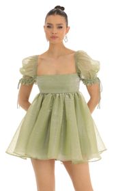 Picture thumb Cheri Glitter Baby Doll Dress in Olive. Source: https://media.lucyinthesky.com/data/Jan23/170xAUTO/a6baf8c9-b622-4d8b-935d-3348751a0605.jpg