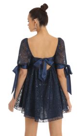 Picture thumb Maia Sequin Lace Baby Doll Dress in Dark Blue. Source: https://media.lucyinthesky.com/data/Jan23/170xAUTO/ad992490-efe5-4d33-8393-3a14b4cfb3e3.jpg