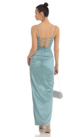Picture thumb Casandra Satin Rhinestone Maxi Dress in Teal. Source: https://media.lucyinthesky.com/data/Jan23/170xAUTO/b8b85096-c139-466e-83b6-4272b334a003.jpg
