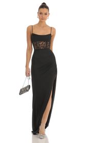 Picture thumb Steffi Cutout Glitter Corset Maxi Dress in Black. Source: https://media.lucyinthesky.com/data/Jan23/170xAUTO/f1ae736b-32d6-4568-990a-ad63c22d2e8d.jpg