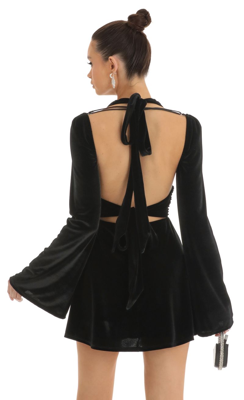 Picture Indya Velvet Cold Shoulder Plunge Dress in Black. Source: https://media.lucyinthesky.com/data/Jan23/800xAUTO/404fe0e0-1c24-41d8-a91e-996bdb586c08.jpg