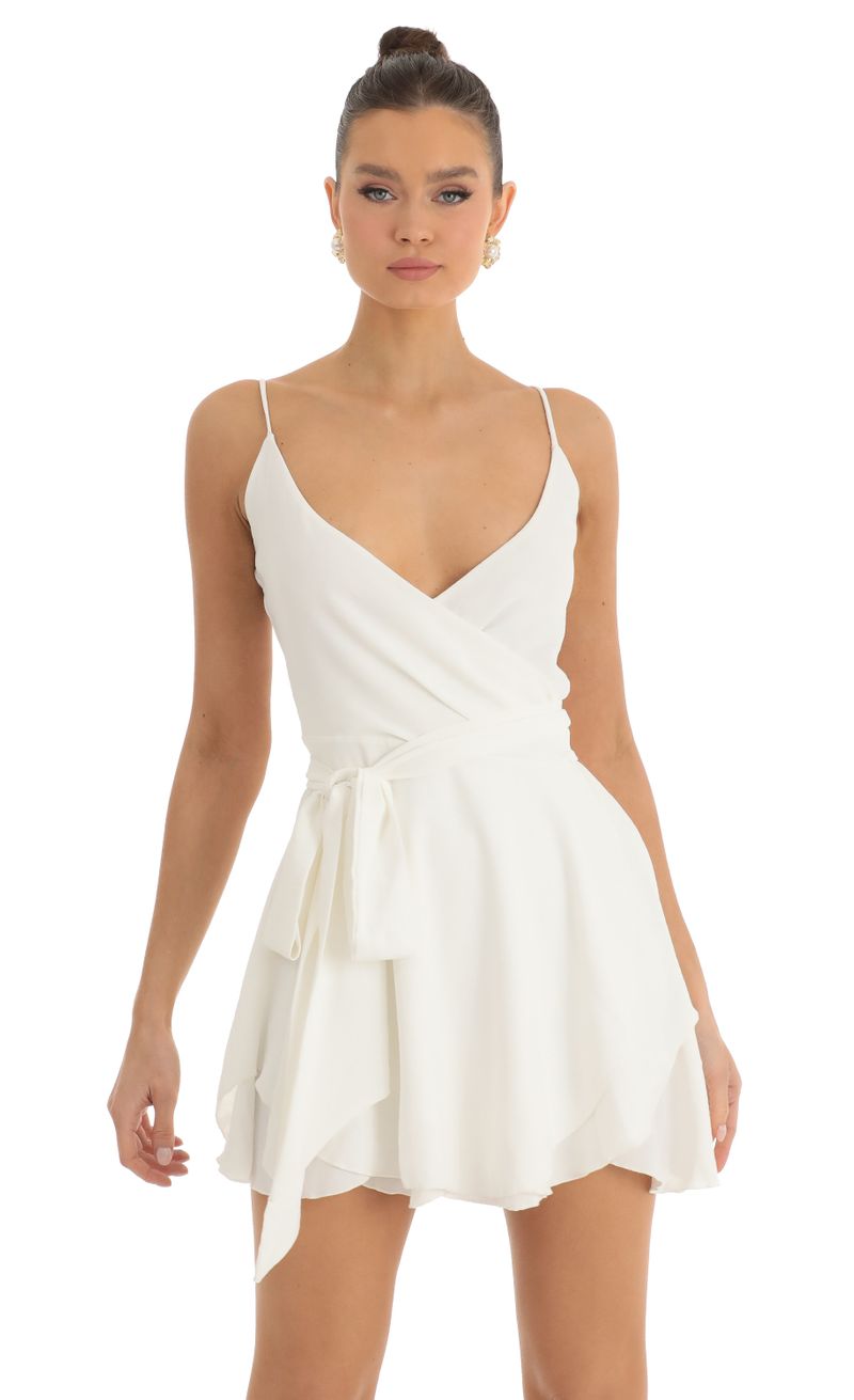 Picture Melody Wrap Skater Dress in Ivory. Source: https://media.lucyinthesky.com/data/Jan23/800xAUTO/6c548ff4-edee-4619-b8f1-96c0a291c997.jpg