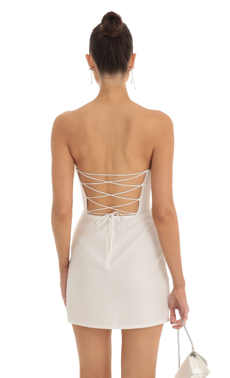 Picture Jolie Feather Corset Dress in White. Source: https://media.lucyinthesky.com/data/Jan23/800xAUTO/cc38ec62-1acd-4d9c-9a05-68cabc2e1b0f.jpg