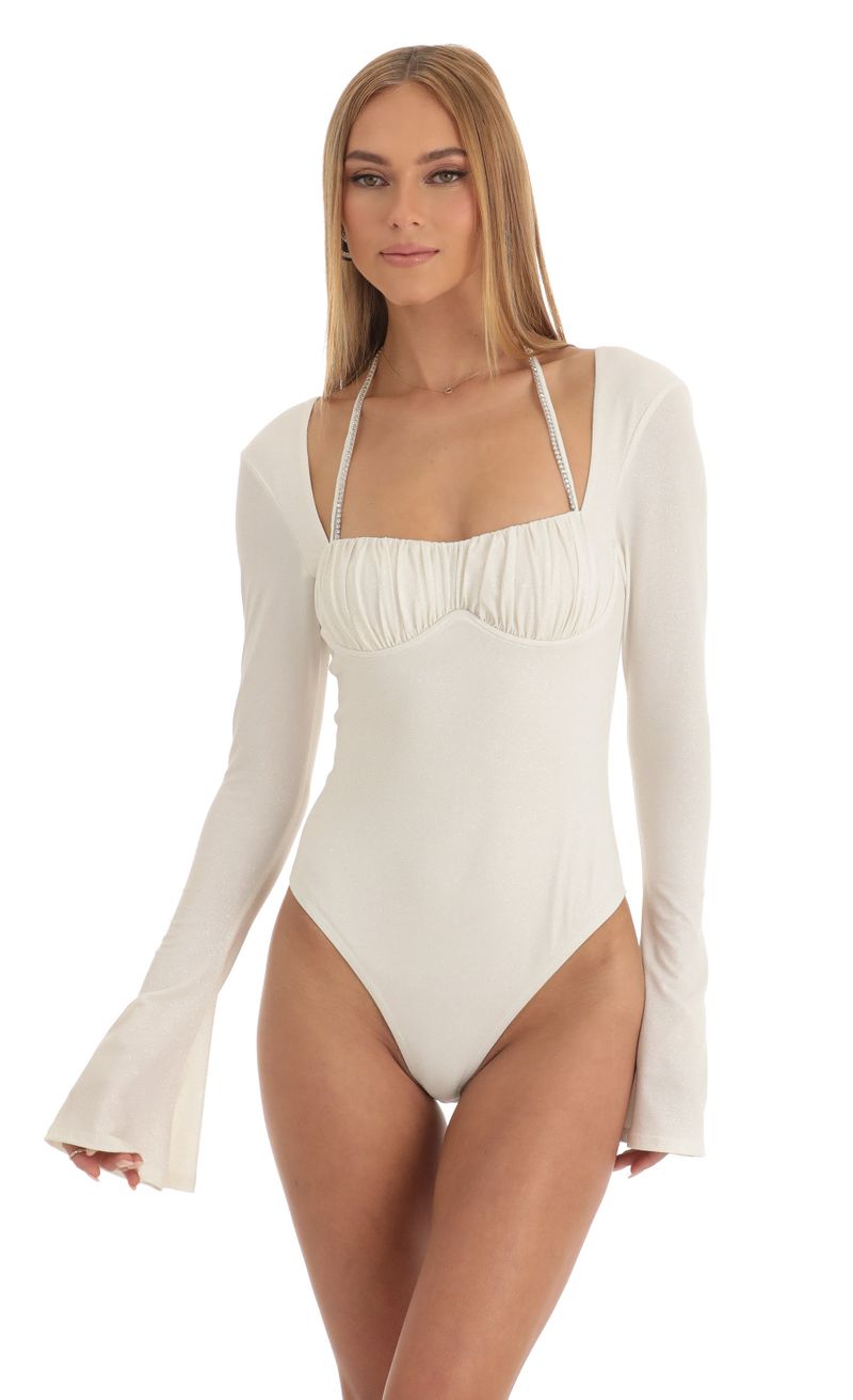 Picture Lexa Glitter Flare Long Sleeve Bodysuit in White. Source: https://media.lucyinthesky.com/data/Jan23/800xAUTO/e6bc2d0c-4ae9-441d-ae6c-0bb60e2c09bc.jpg