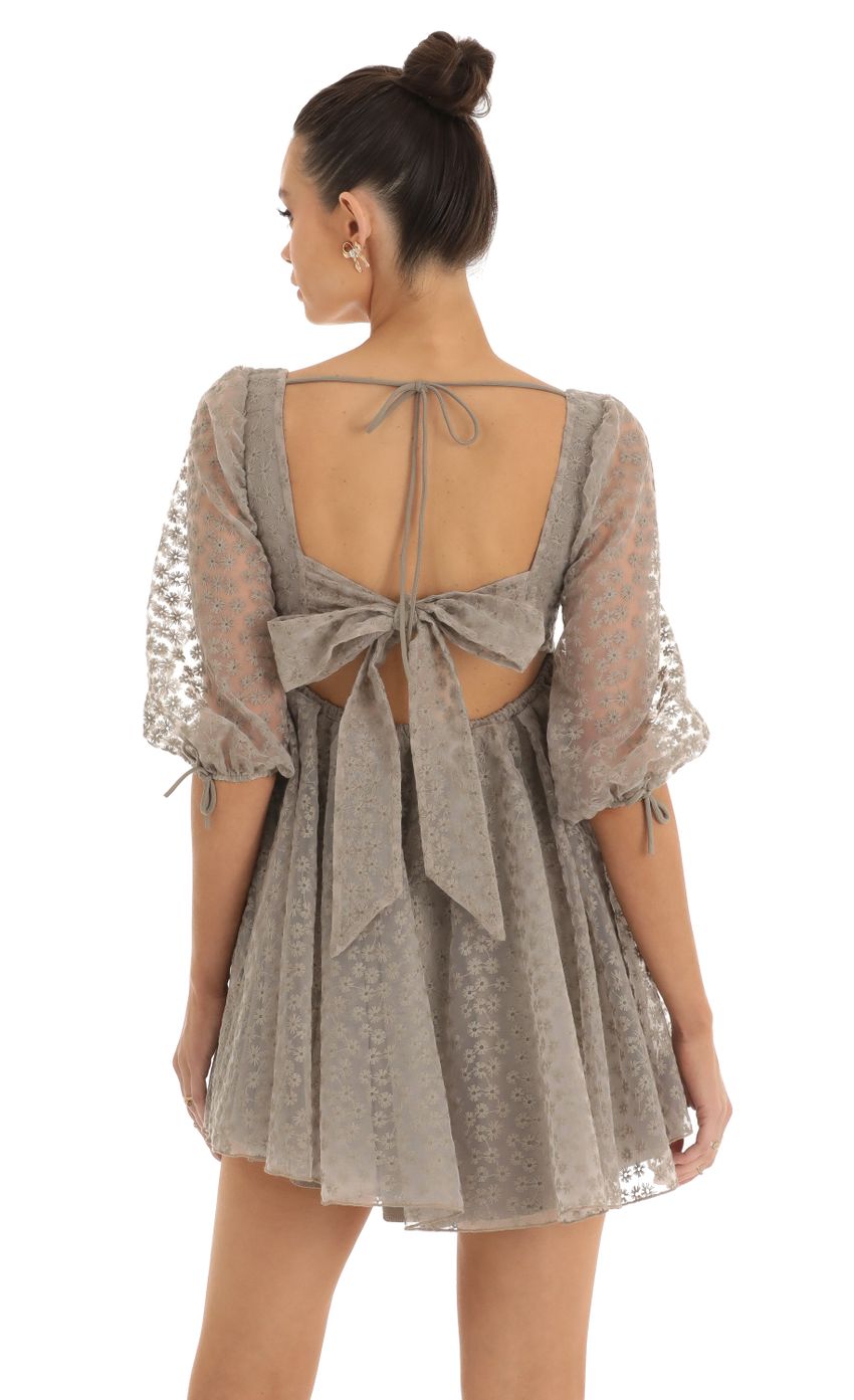 Picture Lania Embroidered Floral Baby Doll Gress in Grey. Source: https://media.lucyinthesky.com/data/Jan23/850xAUTO/073874b0-de1d-4258-9915-80a387cfe52b.jpg