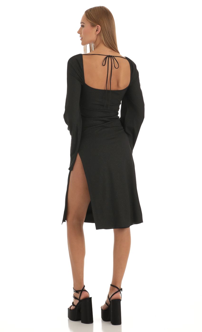 Picture Jazlyn Glitter Flare Sleeve Midi Dress in Black. Source: https://media.lucyinthesky.com/data/Jan23/850xAUTO/0bc2a5cc-57e4-4d49-b948-41c757e1a2c3.jpg