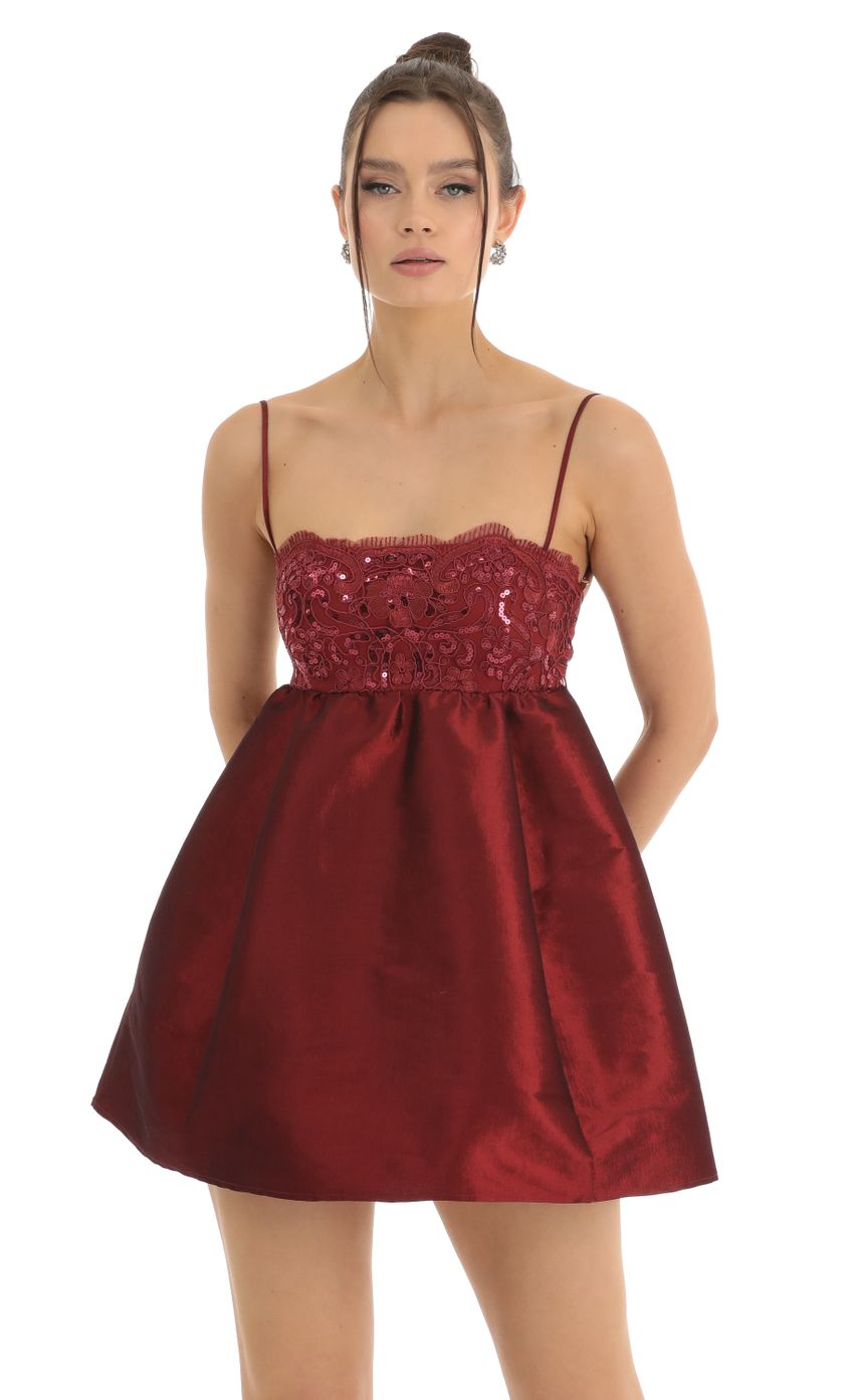 Picture Juno Sequin Embroidered Baby Doll Dress in Red. Source: https://media.lucyinthesky.com/data/Jan23/850xAUTO/18f27de4-ea43-4067-8bbf-312d61caf30e.jpg