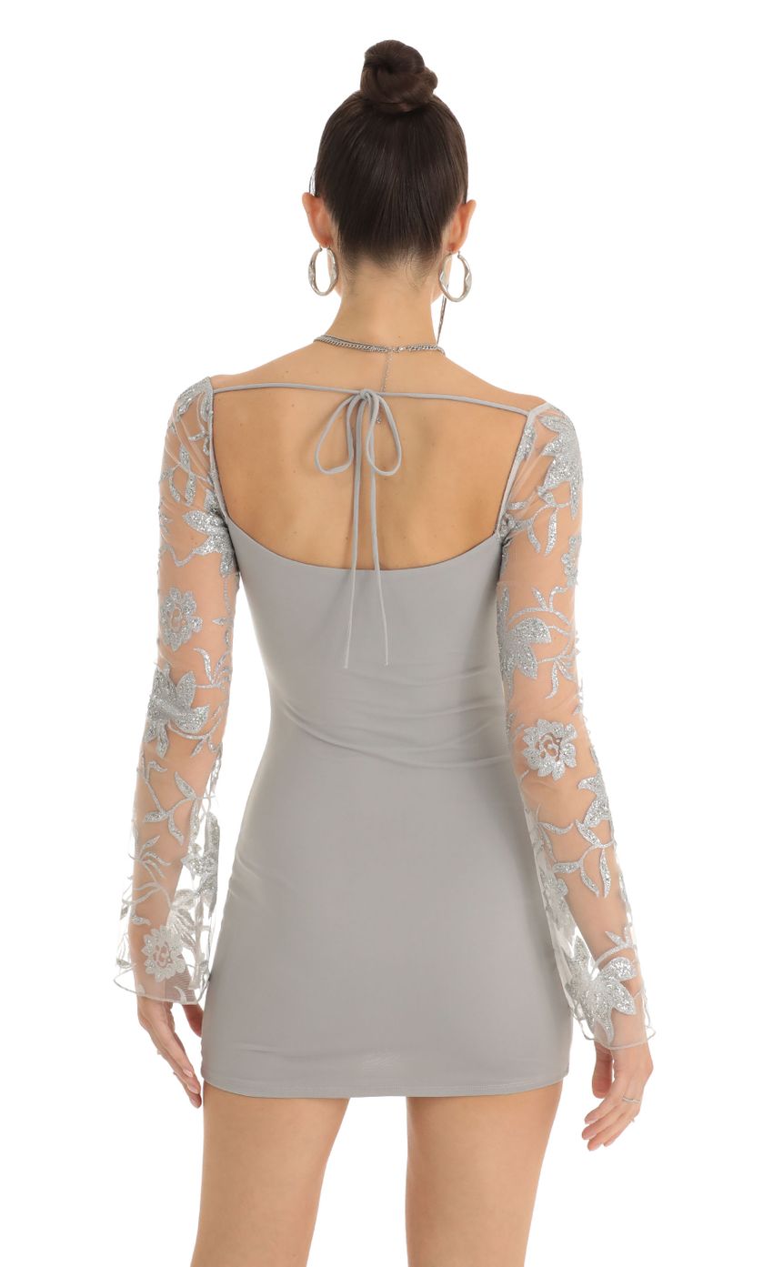 Picture Floral Glitter Long Sleeve Bodycon Dress in Grey. Source: https://media.lucyinthesky.com/data/Jan23/850xAUTO/22ba7e0e-d969-4f99-be87-d16c90edb322.jpg